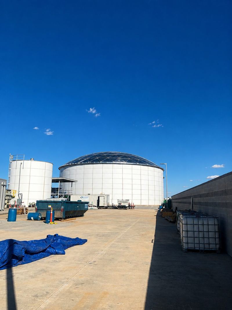 Clear-span aluminum geodesic dome cover on a storage tank