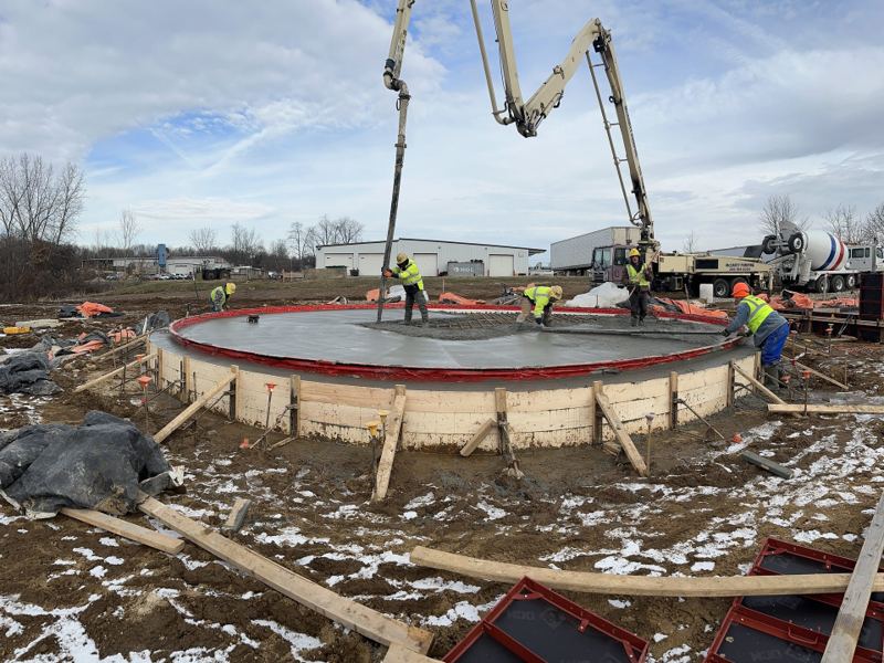 Engineered concrete ring-wall foundation pour for a storage tank