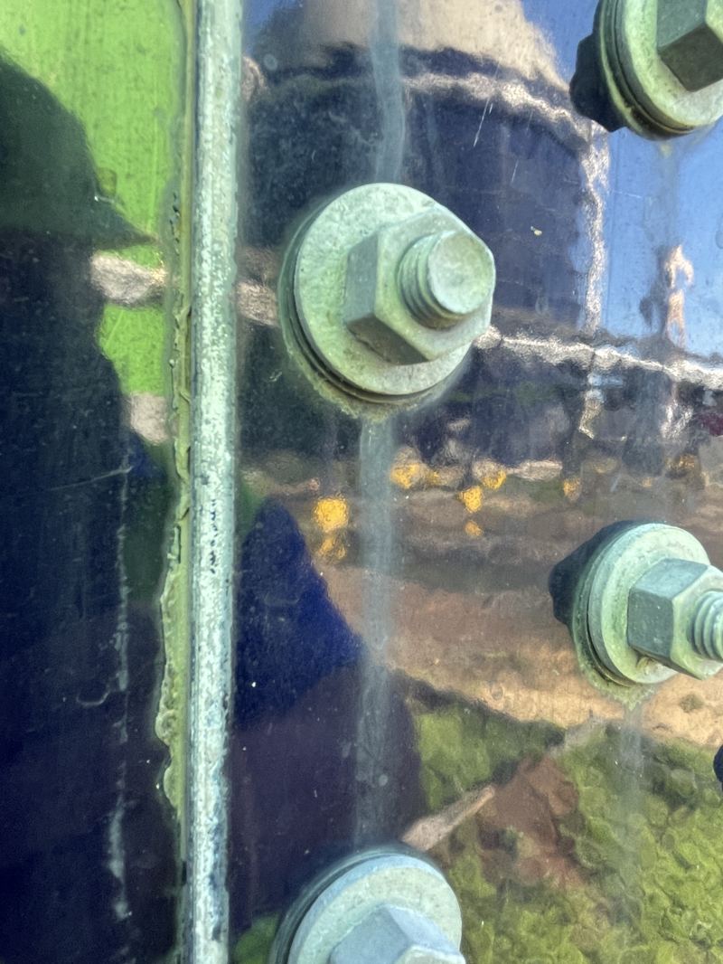 Corrosion building at bolted fasteners where dissimilar metals form a galvanic couple