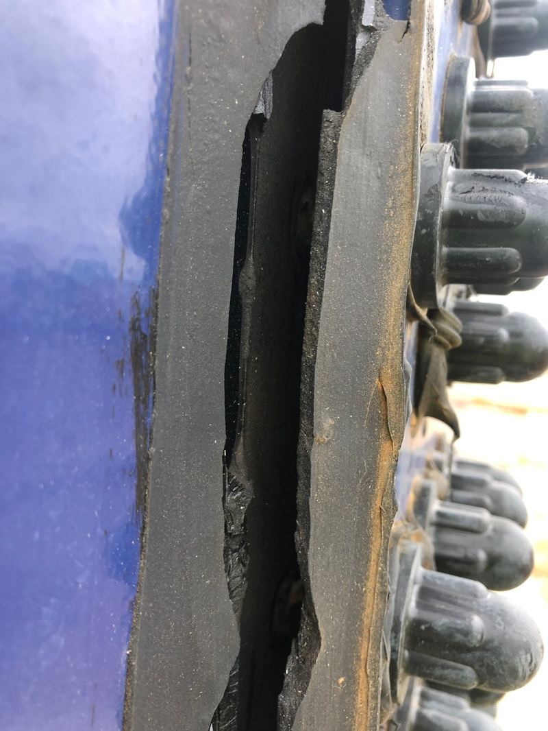 Open gap in the sealant of a bolted tank seam