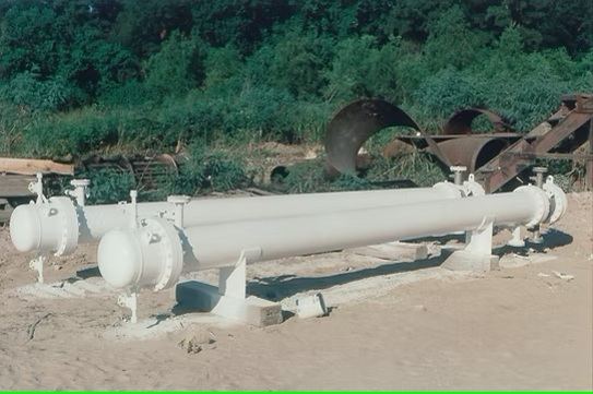 Pair of finished shell-and-tube heat exchangers staged in the fabrication yard