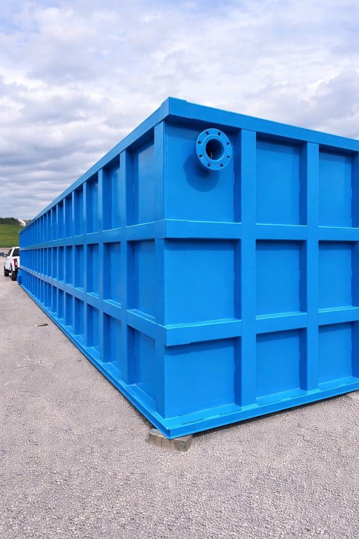 Shop-welded modular steel storage tank field-set on a prepared site