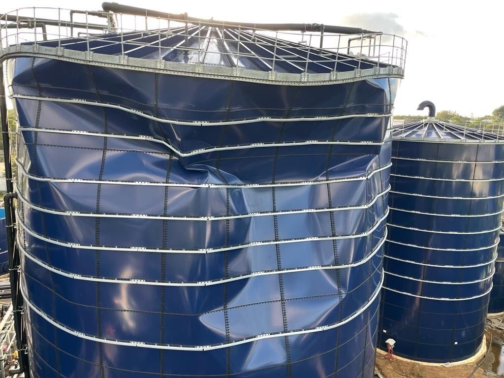 Deformed and lifting interior tank lining showing chemical attack