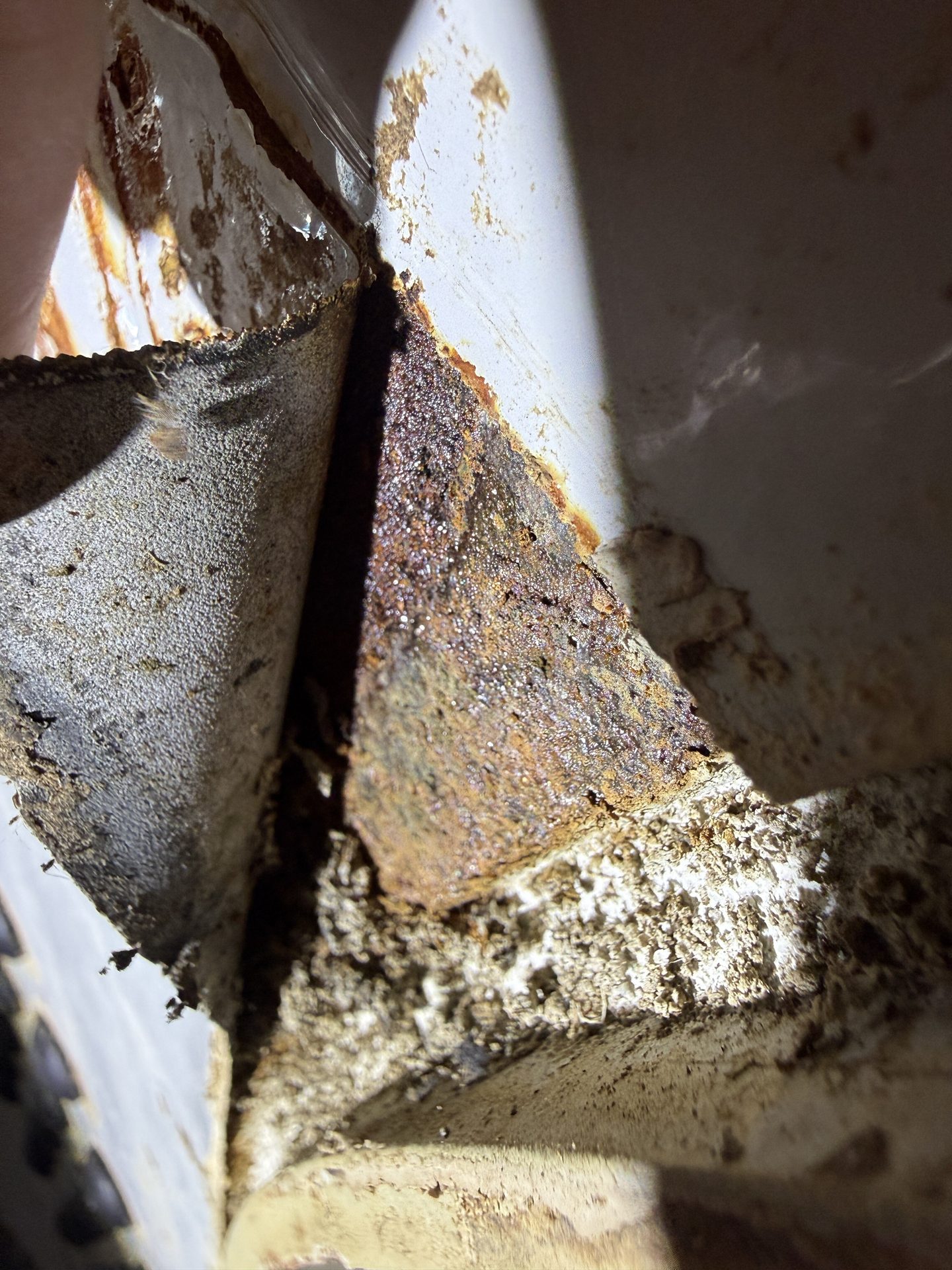 Interior tank surface condition and accumulated corrosion debris